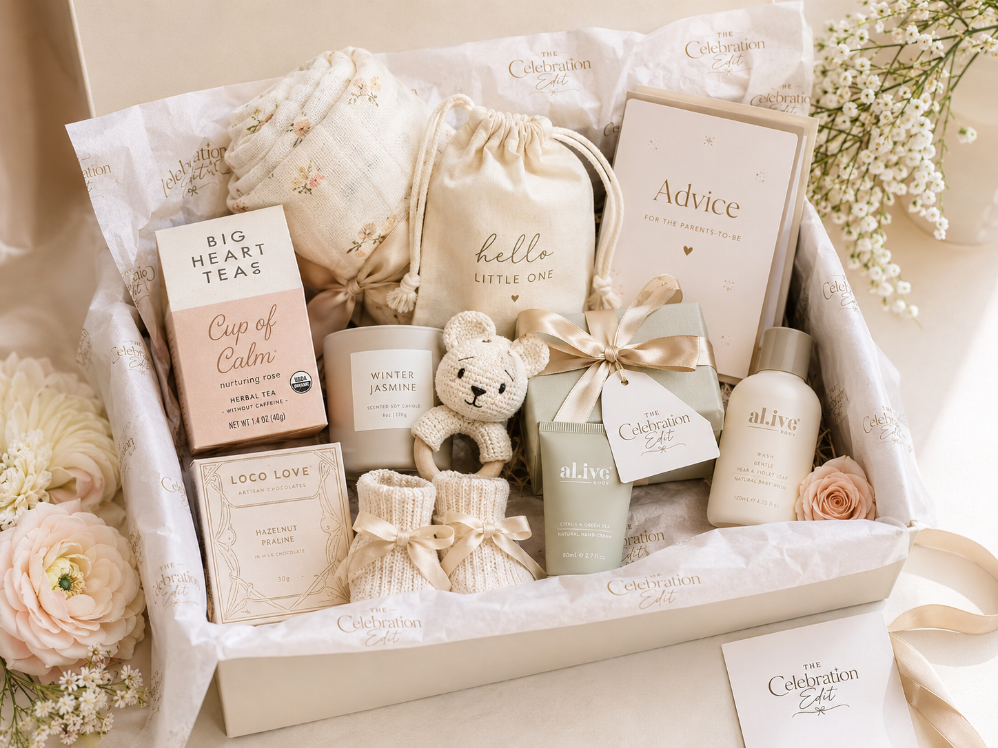 Signature baby shower hamper for parent to be with The Celebration Edit branded tissue paper